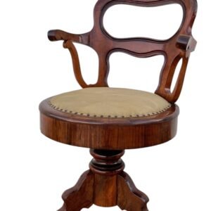 Sillón de madera giratoro isabelino antiguo, década de 1890